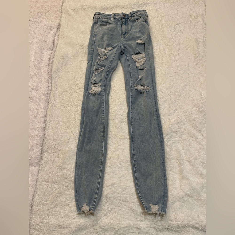 American Eagle high rise skinny Jean(with rips)!Size:0(X-long), Color:Blue